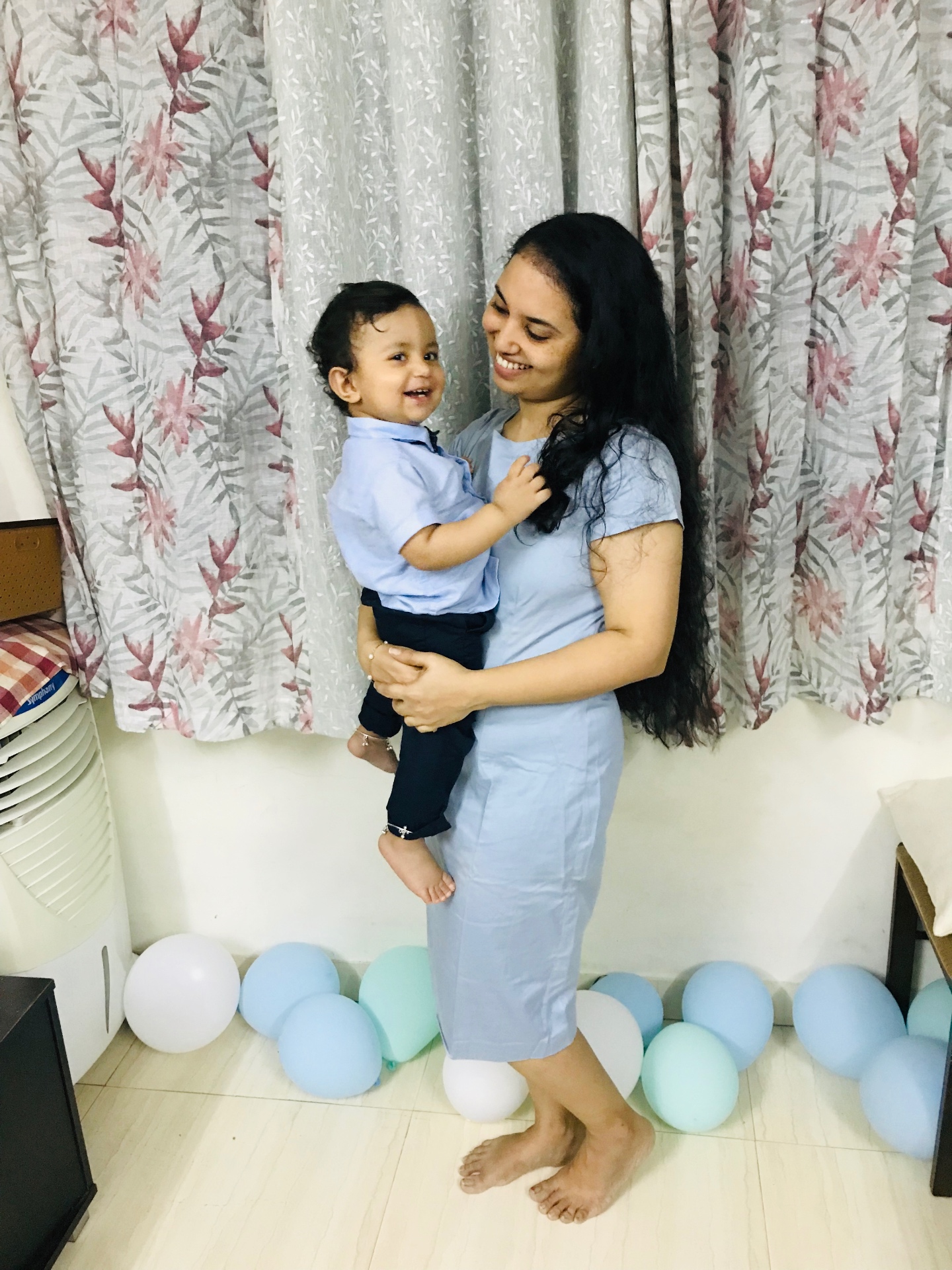 Anjaly after — in a blue dress, lighter and restored